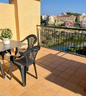 Dúplex con piscina, parking y golf